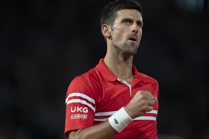 Jun 9, 2021; Paris, France; Novak Djokovic (SRB) reacts during his match against Matteo Berrettini (ITA) on day 11 of the French Open at Stade Roland Garros. Mandatory Credit: Susan Mullane-USA TODAY Sports