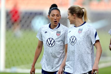 Jun 10, 2021; Houston, Texas, USA; United States forward Christen Press (23, left) and defender Abby Dahlkemper (7) take the field for warmups prior to the match against Portugal during a WNT Summer Series international friendly soccer match at BBVA Stadium. Mandatory Credit: Erik Williams-USA TODAY Sports