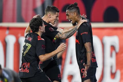 Jun 18, 2021; Harrison, New Jersey, USA;  New York Red Bulls forward Fabio (9) celebrates his goal with midfielder Caden Clark (37) and forward Patryk Klimala (10) against the Nashville SC during the first half at Red Bull Arena. Mandatory Credit: Dennis Schneidler-USA TODAY Sports