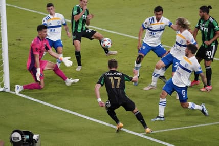 Jun 19, 2021; Austin, TX, USA; San Jose Earthquakes goalie JT Marcinkowski (1) makes a save against Austin FC forward Jon Gallagher (17) in the first half at Q2 Stadium. Mandatory Credit: Scott Wachter-USA TODAY Sports