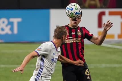 Nov 1, 2020; Atlanta, Georgia, USA; Atlanta United defender Fernando Meza (6) heads the ball over FC Cincinnati midfielder Siem de Jong (11) during the second half at Mercedes-Benz Stadium. Mandatory Credit: Dale Zanine-USA TODAY Sports