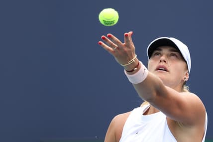 Mar 30, 2021; Miami, Florida, USA; Aryna Sabalenka of Belarus serves against Ashleigh Barty of Australia (not pictured) in a women's singles quarterfinal in the Miami Open at Hard Rock Stadium. Mandatory Credit: Geoff Burke-USA TODAY Sports