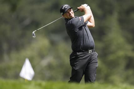 Jul 1, 2021; Detroit, Michigan, USA; Brian Stuard hits his tee shot on the 9th hole during the first round of the Rocket Mortgage Classic golf tournament. Mandatory Credit: Raj Mehta-USA TODAY Sports