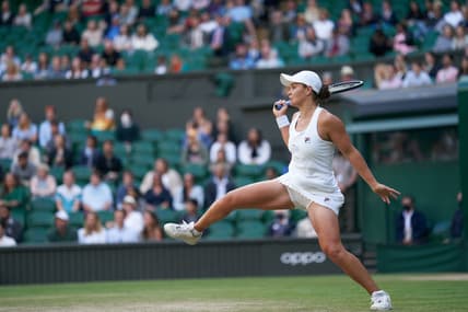 Jul 3, 2021; London, United Kingdom;  Ashleigh Barty (AUS) plays Katerina Siniakova (CZE)  on Centre Court in the women   s third round at All England Lawn Tennis and Croquet Club. Mandatory Credit: Peter van den Berg-USA TODAY Sports