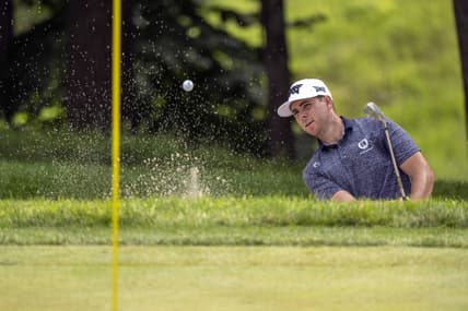 Jul 9, 2021; Silvis, Illinois, USA; Luke List hits a shot out of the bunker onto the 9th green during the second round of the John Deere Classic golf tournament. Mandatory Credit: Marc Lebryk-USA TODAY Sports
