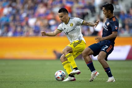 Jul 9, 2021; Cincinnati, OH, USA; FC Cincinnati forward Yuya Kubo (7) defends against Columbus Crew midfielder Lucas Zelarrayan (10) in the first half of the MLS soccer game between FC Cincinnati and Columbus Crew on Friday, July 9, 2021, at TQL Stadium in Cincinnati. Mandatory Credit: Albert Cesare/The Enquirer-USA TODAY NETWORK