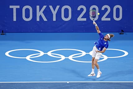 Jul 27, 2021; Tokyo, Japan; Stefanos Tsitsipas (GRE) plays Frances Tiafoe (USA) in the mens tennis first round singles during the Tokyo 2020 Olympic Summer Games at Ariake Tennis Park. Mandatory Credit: Yukihito Taguchi-USA TODAY Sports