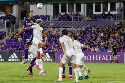 Jul 30, 2021; Orlando, Florida, USA;  Orlando City defender Antonio Carlos (25) heads the ball in the box during the first half against Atlanta United at Orlando City Stadium. Mandatory Credit: Nathan Ray Seebeck-USA TODAY Sports