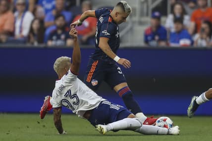 Jul 31, 2021; Cincinnati, OH, USA; D.C. United defender Tony Alfaro (93) battles for the ball against FC Cincinnati midfielder Alvaro Barreal (31) in the first half at TQL Stadium. Mandatory Credit: Katie Stratman-USA TODAY Sports