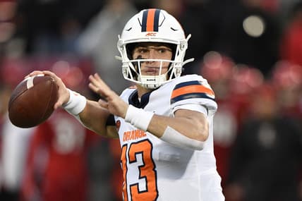 Nov 23, 2019; Louisville, KY, USA; Syracuse Orange quarterback Tommy DeVito (13) looks to pass the ball against the Louisville Cardinals during the first quarter at Cardinal Stadium. Mandatory Credit: Jamie Rhodes-USA TODAY Sports