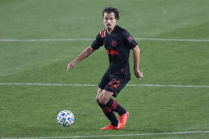 Oct 28, 2020; Harrison, New Jersey, USA; New York Red Bulls midfielder Florian Valot (22) plays the ball during the first half against the New England Revolution at Red Bull Arena. Mandatory Credit: Vincent Carchietta-USA TODAY Sports