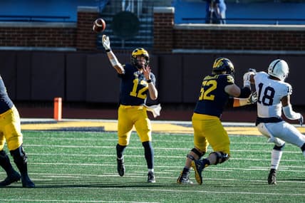 Michigan quarterback Cade McNamara makes a pass against Penn State during the second half of Michigan's 27-17 loss at Michigan Stadium on Saturday, Nov. 28, 2020.