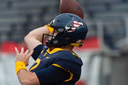 Dec 31, 2020; Memphis, TN, USA; West Virginia Mountaineers quarterback Jarret Doege (2) warms up before the game against the Army Black Knights  at Liberty Bowl Stadium. Mandatory Credit: Justin Ford-USA TODAY Sports