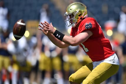 May 1, 2021; Notre Dame, Indiana, USA; Notre Dame Fighting Irish quarterback Jack Coan (17) takes the snap in the first half of the Blue-Gold Game at Notre Dame Stadium. Mandatory Credit: Matt Cashore-USA TODAY Sports