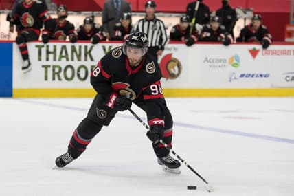 May 3, 2021; Ottawa, Ontario, CAN; Ottawa Senators defenseman Victor Mete (98) controls the puck in the second period against the Winnipeg Jets at the Canadian Tire Centre. Mandatory Credit: Marc DesRosiers-USA TODAY Sports