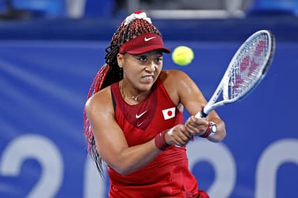 Jul 27, 2021; Tokyo, Japan; Naomi Osaka (JPN) plays Marketa Vondrousova (CZE) in the women's tennis third round singles during the Tokyo 2020 Olympic Summer Games at Ariake Tennis Park. Mandatory Credit: Yukihito Taguchi-USA TODAY Sports