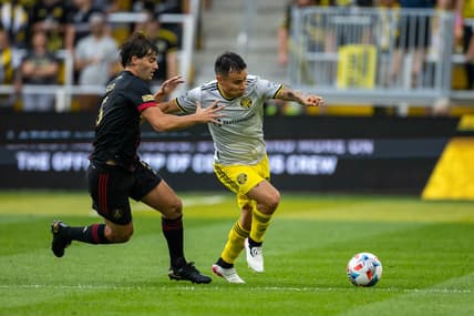 Aug 7, 2021; Columbus, Ohio, USA; Columbus Crew midfielder Lucas Zelarrayan (10) dribbles the ball against Atlanta United midfielder Santiago Sosa (5) in the first half at Lower.com Stadium. Mandatory Credit: Trevor Ruszkowski-USA TODAY Sports