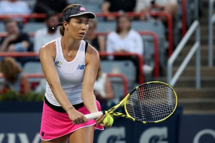 Aug 11, 2021; Montreal, Quebec, Canada; Danielle Collins from USA serves against Simona Halep from Romania (not pictured) during the second round play at Stade IGA. Mandatory Credit: Jean-Yves Ahern-USA TODAY Sports