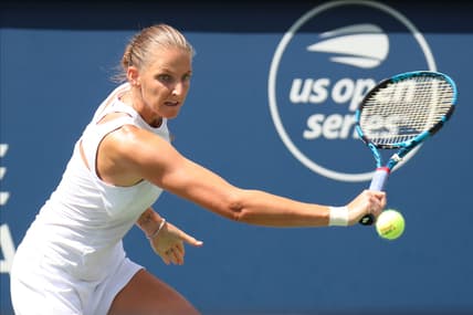 Aug 14, 2021; Montreal, Quebec, Canada; Karolina Pliskova from Czech Republic hits a shot against Aryna Sabalenka from Belarus (not pictured) during the semifinals at Stade IGA. Mandatory Credit: Jean-Yves Ahern-USA TODAY Sports