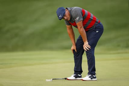 Aug 29, 2021; Owings Mills, Maryland, USA; Bryson DeChambeau reacts after missing a putt on the third playoff hole of the the final round of the BMW Championship golf tournament. Mandatory Credit: Scott Taetsch-USA TODAY Sports