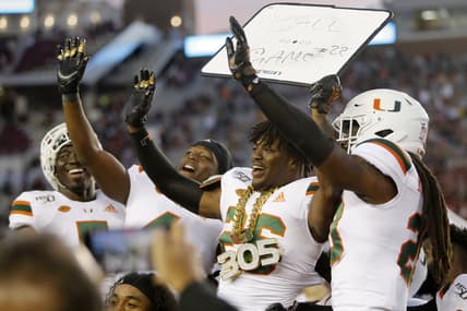 Nov 2, 2019; Tallahassee, FL, USA; Miami Hurricanes defensive back Gurvan Hall Jr. (26) celebrates after making a fourth quarter interception as the Florida State Seminoles host the Miami Hurricanes at Doak Campbell Stadium. Mandatory Credit: Glenn Beil-USA TODAY Sports