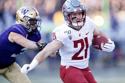 Nov 29, 2019; Seattle, WA, USA; Washington State Cougars running back Max Borghi (21) rushes against Washington Huskies defensive back Elijah Molden (3) during the first quarter at Husky Stadium. Mandatory Credit: Jennifer Buchanan-USA TODAY Sports