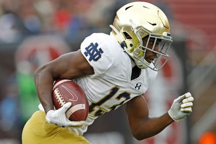 Nov 30, 2019; Stanford, CA, USA; Notre Dame Fighting Irish wide receiver Lawrence Keys III (13) returns a kickoff during the first quarter against the Stanford Cardinal at Stanford Stadium. Mandatory Credit: Darren Yamashita-USA TODAY Sports