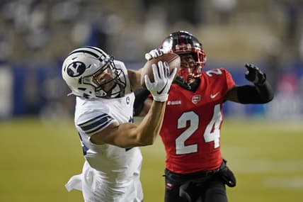 Oct 31, 2020; Provo, UT, USA; BYU wide receiver Gunner Romney (left) catches a pass against Western Kentucky defensive back Roger Cray (24) in the first half of an NCAA college football game Saturday, Oct. 31, 2020, in Provo, Utah. Mandatory Credit: Rick Bowmer/Pool Photo-USA TODAY Sports