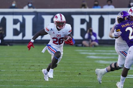 Nov 28, 2020; Greenville, North Carolina, USA; Southern Methodist Mustangs running back Ulysses Bentley IV (26) runs the ball against the East Carolina Pirates at Dowdy-Ficklen Stadium. Mandatory Credit: James Guillory-USA TODAY Sports