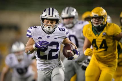 Nov 28, 2020; Waco, Texas, USA; Kansas State Wildcats running back Deuce Vaughn (22) runs for a touchdown against the Baylor Bears during the fourth quarter at McLane Stadium. Mandatory Credit: Jerome Miron-USA TODAY Sports