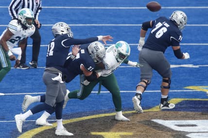 Dec 22, 2020; Boise, Idaho, USA; Nevada Wolf Pack quarterback Carson Strong (12) throws a pass  during the first half of the Famous Idaho Potato Bowl versus the Tulane Green Wave  at Albertsons Stadium. Mandatory Credit: Brian Losness-USA TODAY Sports