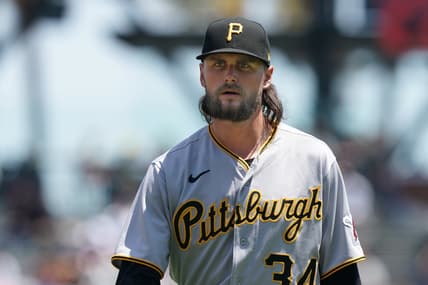 Jul 25, 2021; San Francisco, California, USA; Pittsburgh Pirates starting pitcher JT Brubaker (34) walks to the dugout before the game against the San Francisco Giants at Oracle Park. Mandatory Credit: Darren Yamashita-USA TODAY Sports