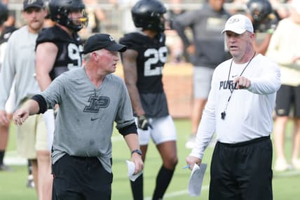 Purdue head coach Jeff Brohm talks with co-defensive coordinator and linebackers coach Brad Lambert during practice, Friday, Aug. 6, 2021 at Ross-Ade Stadium in West Lafayette.

Purdue Football Camp