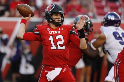 Sep 2, 2021; Salt Lake City, Utah, USA; Utah Utes quarterback Charlie Brewer (12) looks to pass against the Weber State Wildcats at Rice-Eccles Stadium. Mandatory Credit: Jeffrey Swinger-USA TODAY Sports