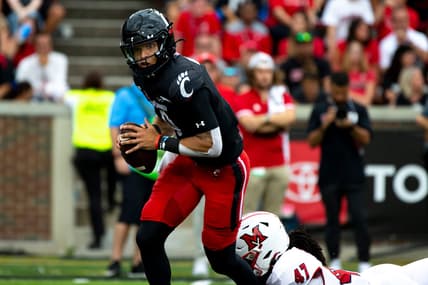 Cincinnati Bearcats quarterback Desmond Ridder (9) is sacked by Miami Redhawks defensive lineman Lonnie Phelps (47) in the second half of the NCAA football game on Saturday, Sept. 4, 2021, at Nippert Stadium in Cincinnati. Cincinnati Bearcats defeated Miami Redhawks 49-14.

Cincinnati Bearcats Miami Redhawks