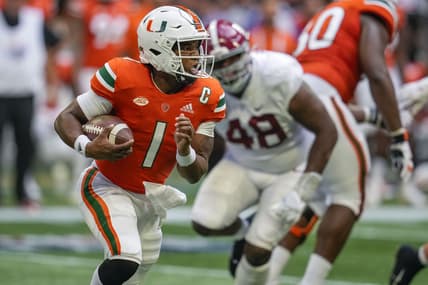 Sep 4, 2021; Atlanta, Georgia, USA; Miami Hurricanes quarterback D'Eriq King (1) runs with the ball against the Alabama Crimson Tide during the second half at Mercedes-Benz Stadium. Mandatory Credit: Dale Zanine-USA TODAY Sports