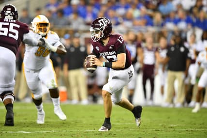 Sep 4, 2021;  College Station, Texas, USA;  Texas A&M Aggies quarterback Haynes King (13) runs the ball during the second quarter against the Kent State Golden Flashes at Kyle Field. Mandatory Credit: Maria Lysaker-USA TODAY Sports