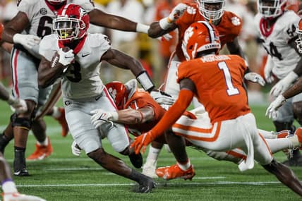 Sep 4, 2021; Charlotte, North Carolina, USA; Georgia Bulldogs running back Zamir White (3) is tackled by Clemson Tigers linebacker James Skalski (47) during the second half at Bank of America Stadium. Mandatory Credit: Jim Dedmon-USA TODAY Sports