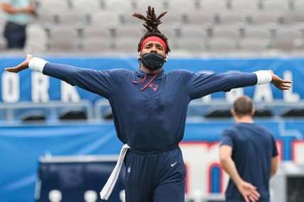 Aug 29, 2021; East Rutherford, New Jersey, USA; New England Patriots quarterback Cam Newton (1) warms up against the New York Giants before the game at MetLife Stadium. Mandatory Credit: Vincent Carchietta-USA TODAY Sports