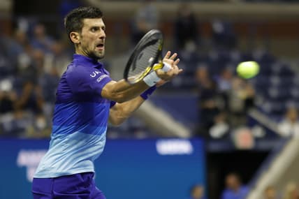 Sep 8, 2021; Flushing, NY, USA; Novak Djokovic of Serbia hits a forehand against Matteo Berrettini of Italy (not pictured) on day ten of the 2021 U.S. Open tennis tournament at USTA Billie Jean King National Tennis Center. Mandatory Credit: Geoff Burke-USA TODAY Sports
