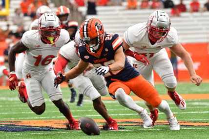 Sep 11, 2021; Syracuse, New York, USA; Syracuse Orange wide receiver Trebor Pena (29) goes to recover a muffed punt return as Rutgers Scarlet Knights defensive back Max Melton (16) and Rutgers Scarlet Knights long snapper Billy Taylor (47) come in during the second quarter at the Carrier Dome. Mandatory Credit: Mark Konezny-USA TODAY Sports