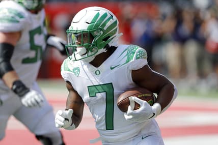 Sep 11, 2021; Columbus, Ohio, USA; Oregon Ducks running back CJ Verdell (7) runs during the third quarter against the Ohio State Buckeyes at Ohio Stadium. Mandatory Credit: Joseph Maiorana-USA TODAY Sports