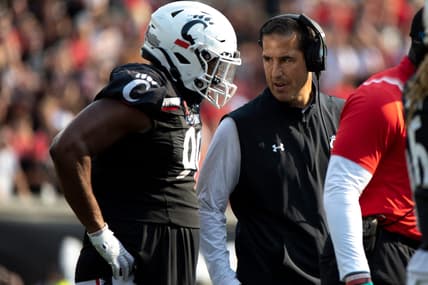 Cincinnati Bearcats head coach Luke Fickell talks to Cincinnati Bearcats defensive lineman Jabari Taylor (90) in the first half of the NCAA football game between Cincinnati Bearcats and Murray State Racers on Saturday, Sept. 11, 2021, at Nippert Stadium in Cincinnati.

Murray State Racers At Cincinnati Bearcats