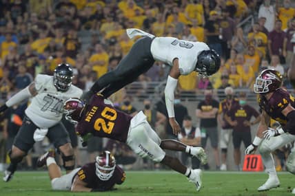 Sep 11, 2021; Tempe, Arizona, USA; UNLV Rebels quarterback Doug Brumfield (2) dives for a touchdown against the Arizona State Sun Devils during the first half at Sun Devil Stadium. Mandatory Credit: Joe Camporeale-USA TODAY Sports