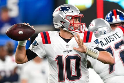 Aug 29, 2021; East Rutherford, New Jersey, USA; New England Patriots quarterback Mac Jones (10) attempts a pass against the New York Giants during the third quarter at MetLife Stadium. Mandatory Credit: Dennis Schneidler-USA TODAY Sports