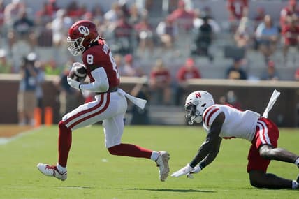 Oklahoma's Michael Woods II (8) catches the ball in front of of Nebraska's Cam Taylor-Britt (5) during a college football game between the University of Oklahoma Sooners (OU) and the Nebraska Cornhuskers at Gaylord Family-Oklahoma Memorial Stadium in Norman, Okla., Saturday, Sept. 18, 2021.

Lx14541