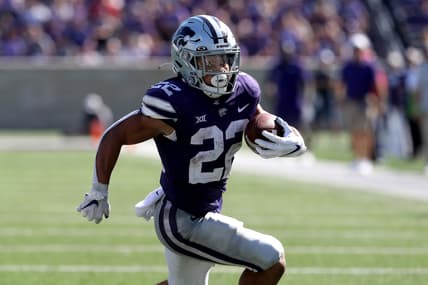 Sep 18, 2021; Manhattan, Kansas, USA; Kansas State Wildcats running back Deuce Vaughn (22) carries the ball during the fourth quarter against the Nevada Wolf Pack at Bill Snyder Family Football Stadium. Mandatory Credit: Scott Sewell-USA TODAY Sports