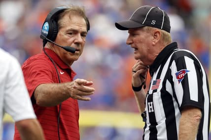 Sep 18, 2021; Gainesville, Florida, USA; Alabama Crimson Tide head coach Nick Saban talks to the referee against the Florida Gators during the second half at Ben Hill Griffin Stadium. Mandatory Credit: Kim Klement-USA TODAY Sports