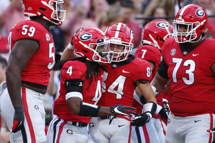 Sep 18, 2021; Athens, Georgia, USA; Georgia Bulldogs running back James Cook (4) celebrates with his teammates after scoring a touchdown against the South Carolina Gamecocks during the first half at Sanford Stadium. Mandatory Credit: Joshua L. Jones/Athens Banner-Herald via USA TODAY NETWORK