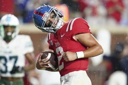 Sep 18, 2021; Oxford, Mississippi, USA; Mississippi Rebels quarterback Matt Corral (2) scores against Tulane Green Wave at Vaught-Hemingway Stadium. Mandatory Credit: Marvin Gentry-USA TODAY Sports